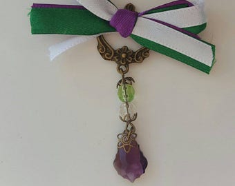 Suffragette inspired ribbon bronze brooch