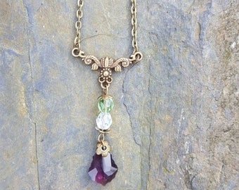 Suffragette inspired Antique Gold necklace.