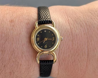 1980s Gucci Gold Tone Wrist Watch. Cream Color Face With 
