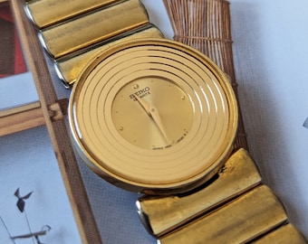 Vintage SEIKO 1N00-0B59 Modernist Gold  Quartz Watch with New Battery. Best fits 6” wrist or smaller.