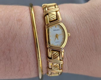 Montre à quartz vintage dorée GREUN : cadran en demi-lune, convient à un poignet de 6 po.