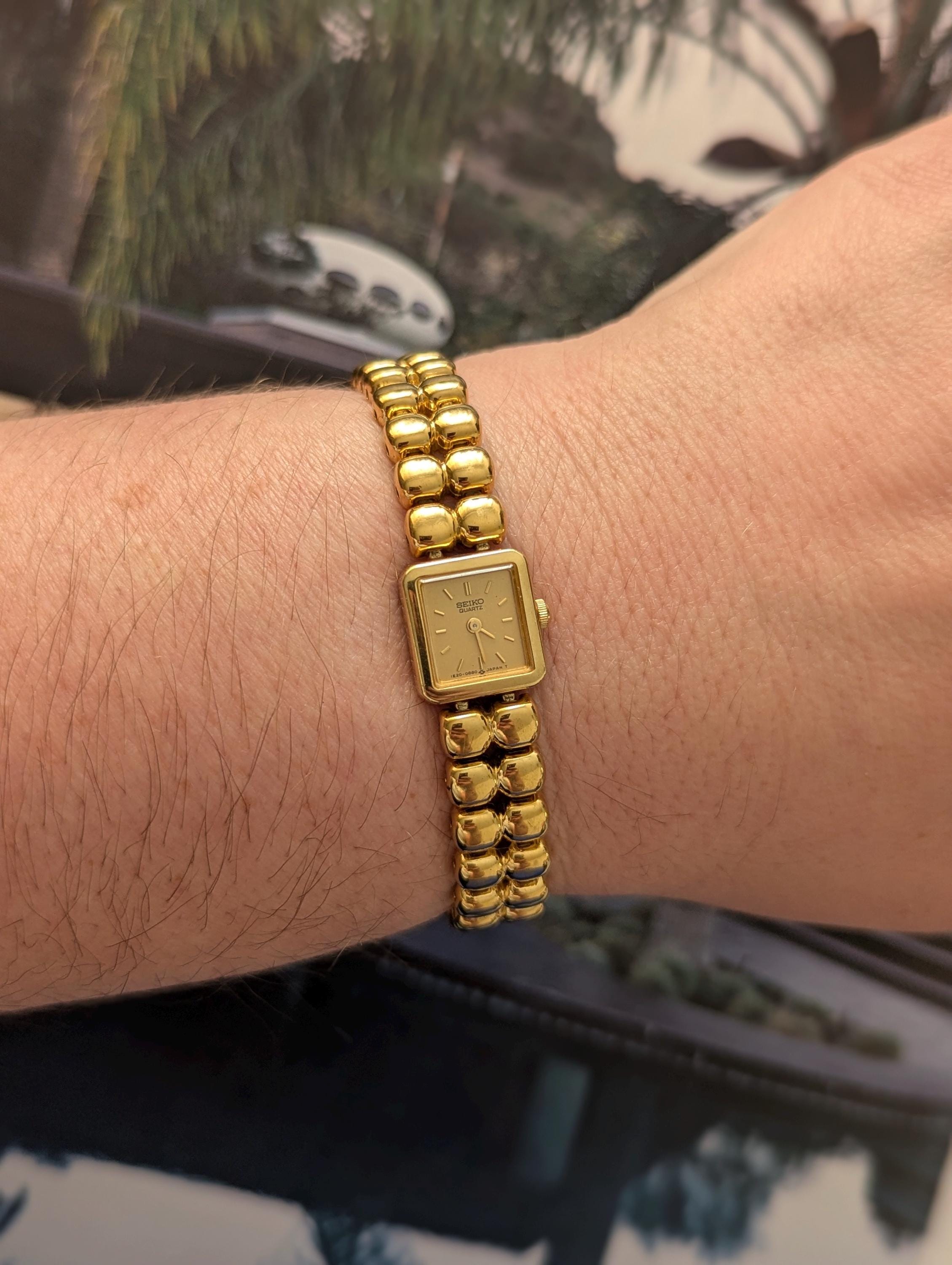 Vintage Seiko Gold Tone Quartz Watch With Small Square Face and