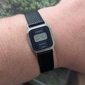 Vintage CITIZEN Silver Tone Digital Quartz Watch with New Black Leather Band and New Battery. Best fits 7” wrist or smaller. image 1