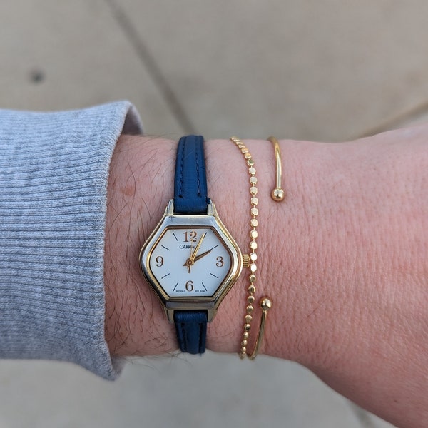 Vintage Carriage by TIMEX Hexagon Gold Tone Quartz Watch with New XL Blue Leather Band and New battery. Best fits up to 8” wrist.