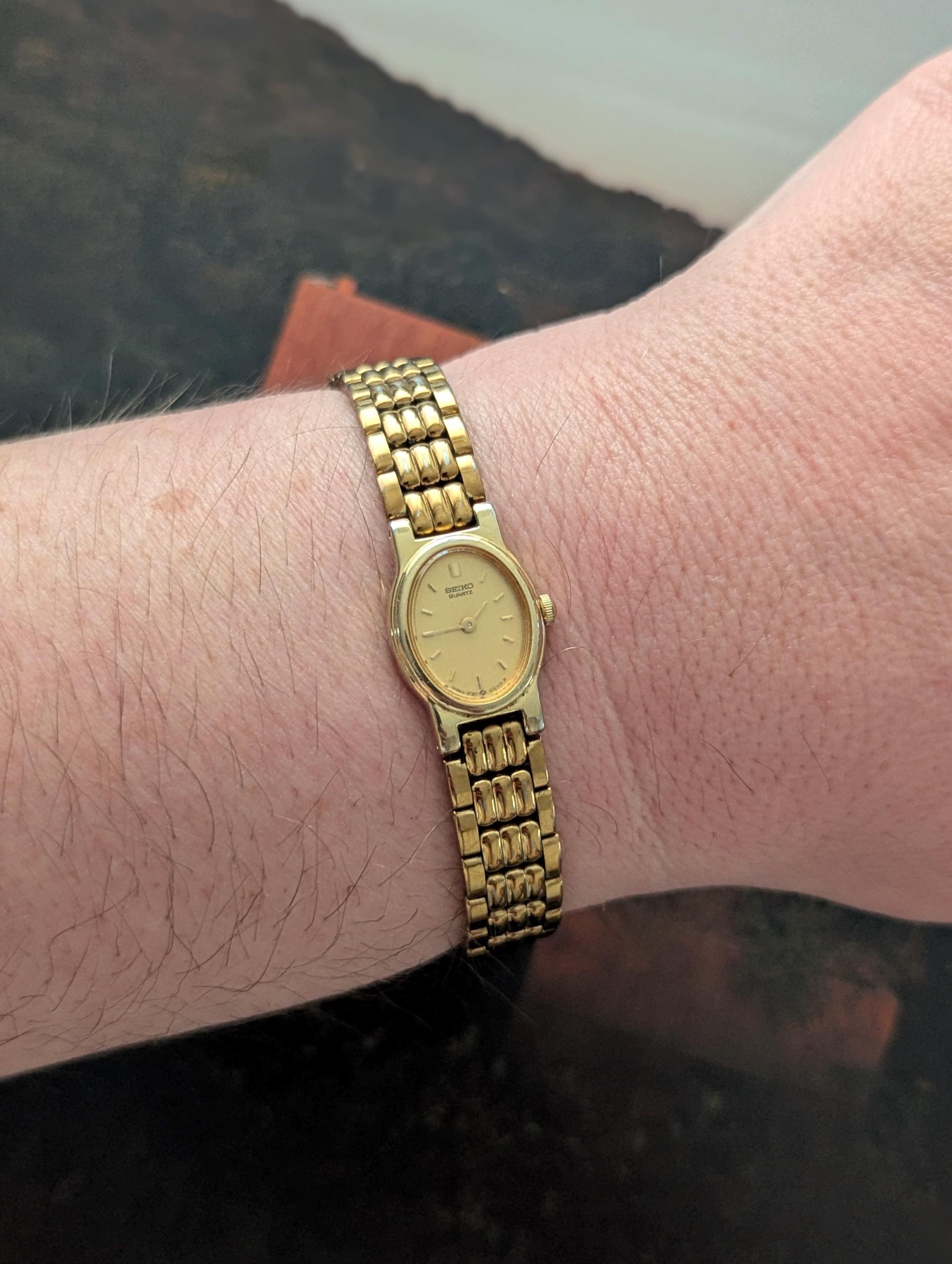 Vintage SEIKO With Smal Oval Gold Tone Face, Original Band 