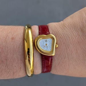 Vintage HEEL Gold Tone Cuff Quartz Watch From Japan With