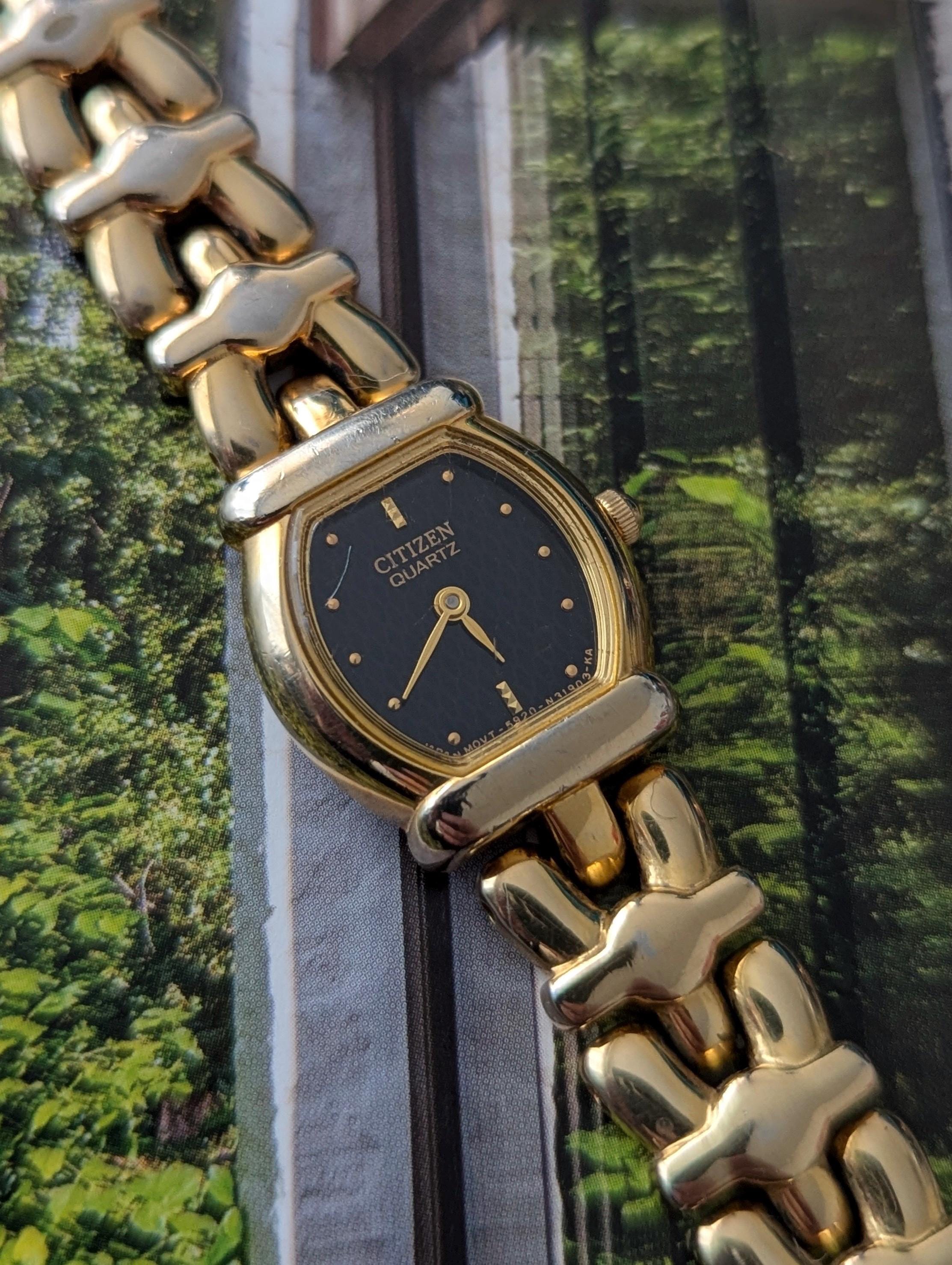 Vintage CITIZEN Gold Tone Tank Quartz Watch With Black Face and