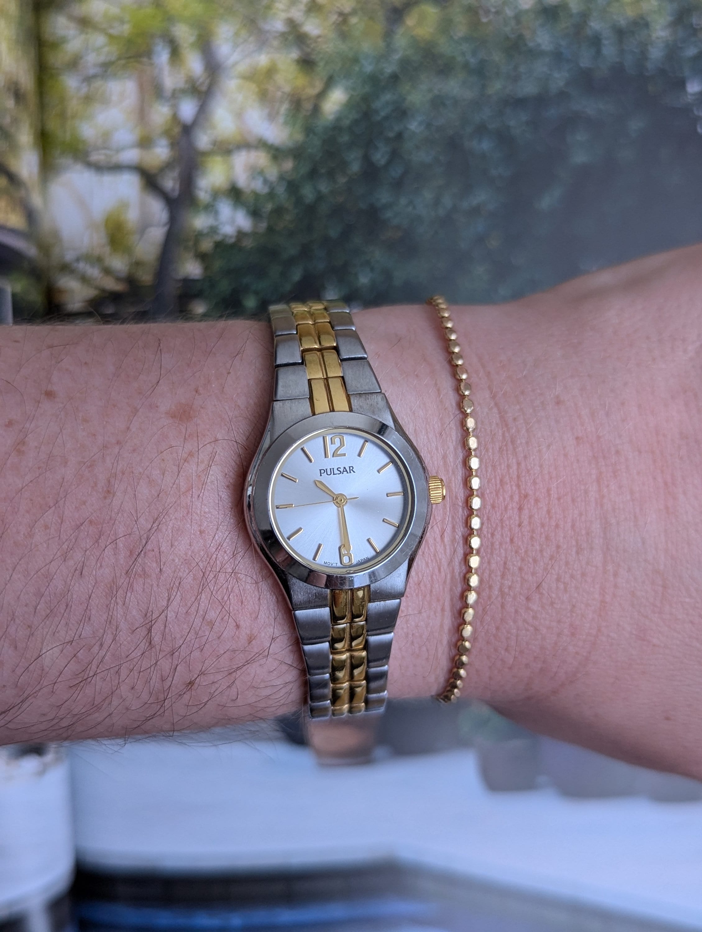 Vintage PULSAR tweekleurig rond quartzhorloge met nieuwe batterij