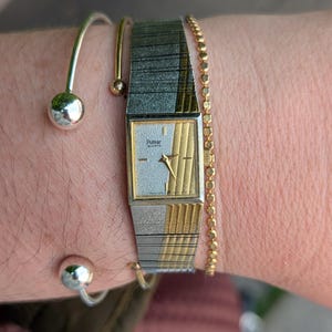 Vintage PULSAR Two Tone Tank Quartz Watch with New Battery. Best fits 6.5” wrist or smaller.
