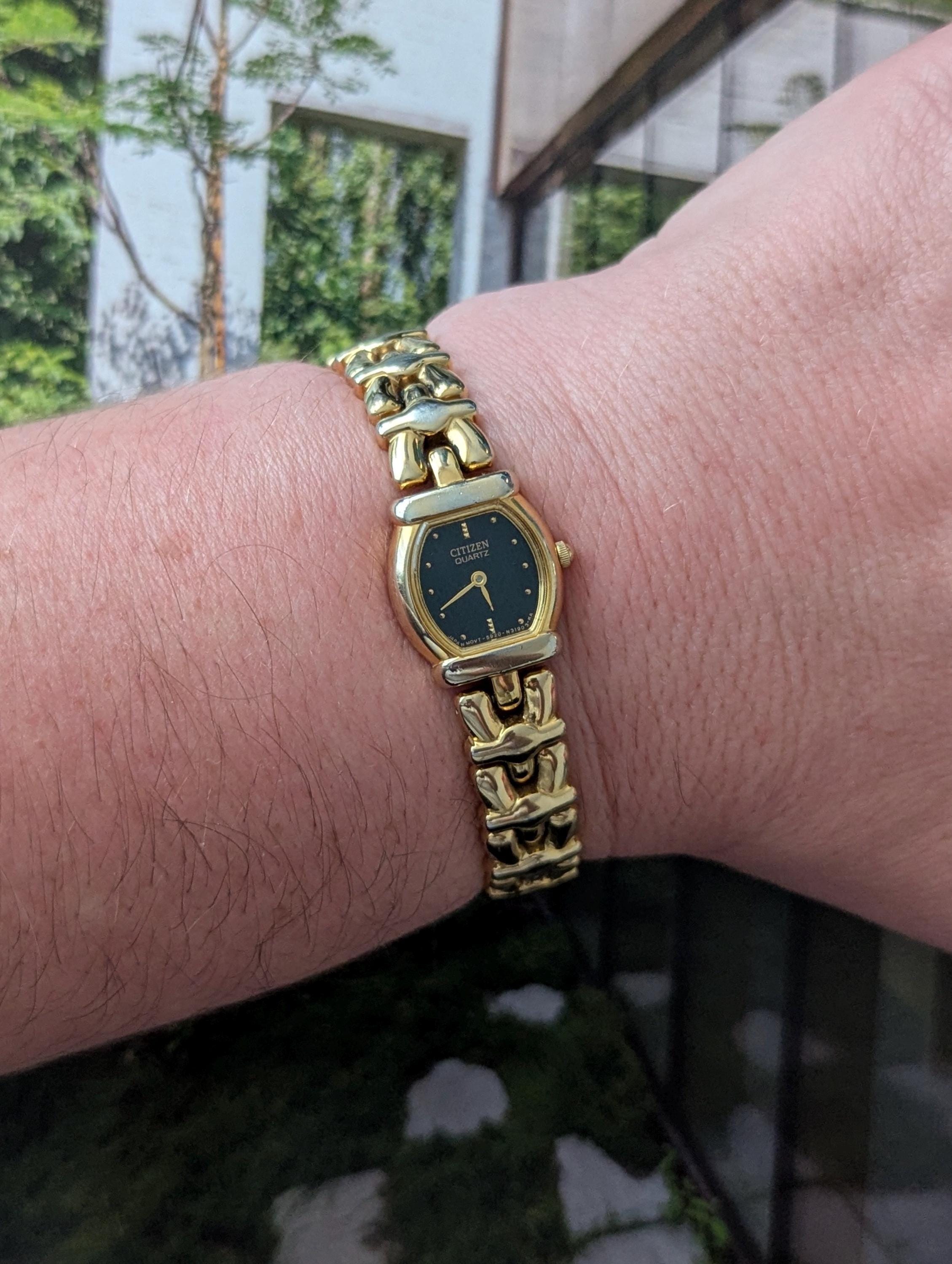 Vintage CITIZEN Gold Tone Tank Quartz Watch With Black Face and