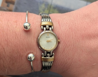 Vintage Seiko Two Tone Quartz Watch with Round Face and New Battery. Best fits 6.5” wrist or smaller. *PLUS SIZE AVAILABLE*