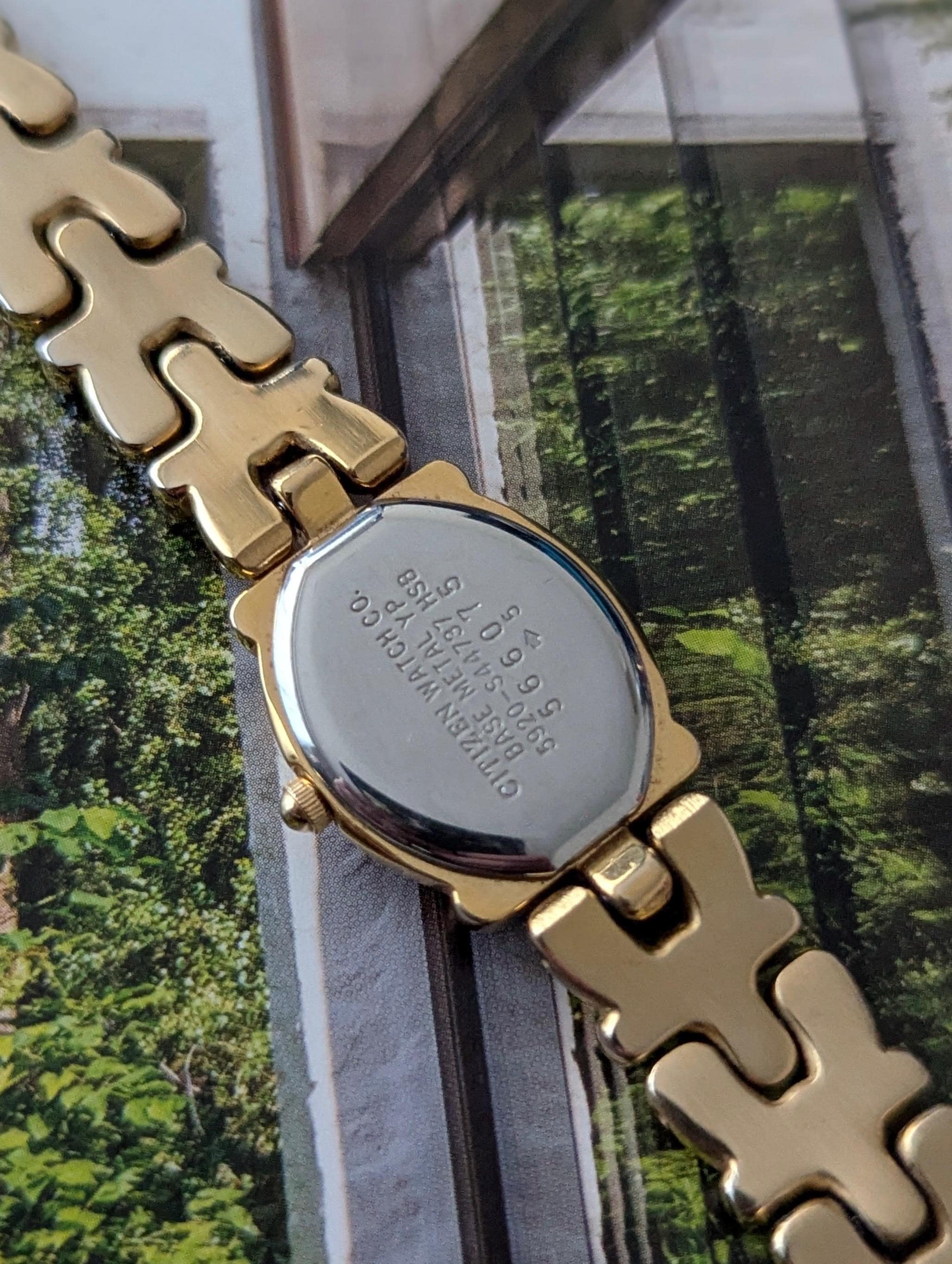 Vintage CITIZEN Gold Tone Tank Quartz Watch With Black Face 