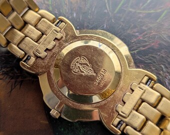 Vintage GUCCI Gold Tone Quartz Watch With Black Face
