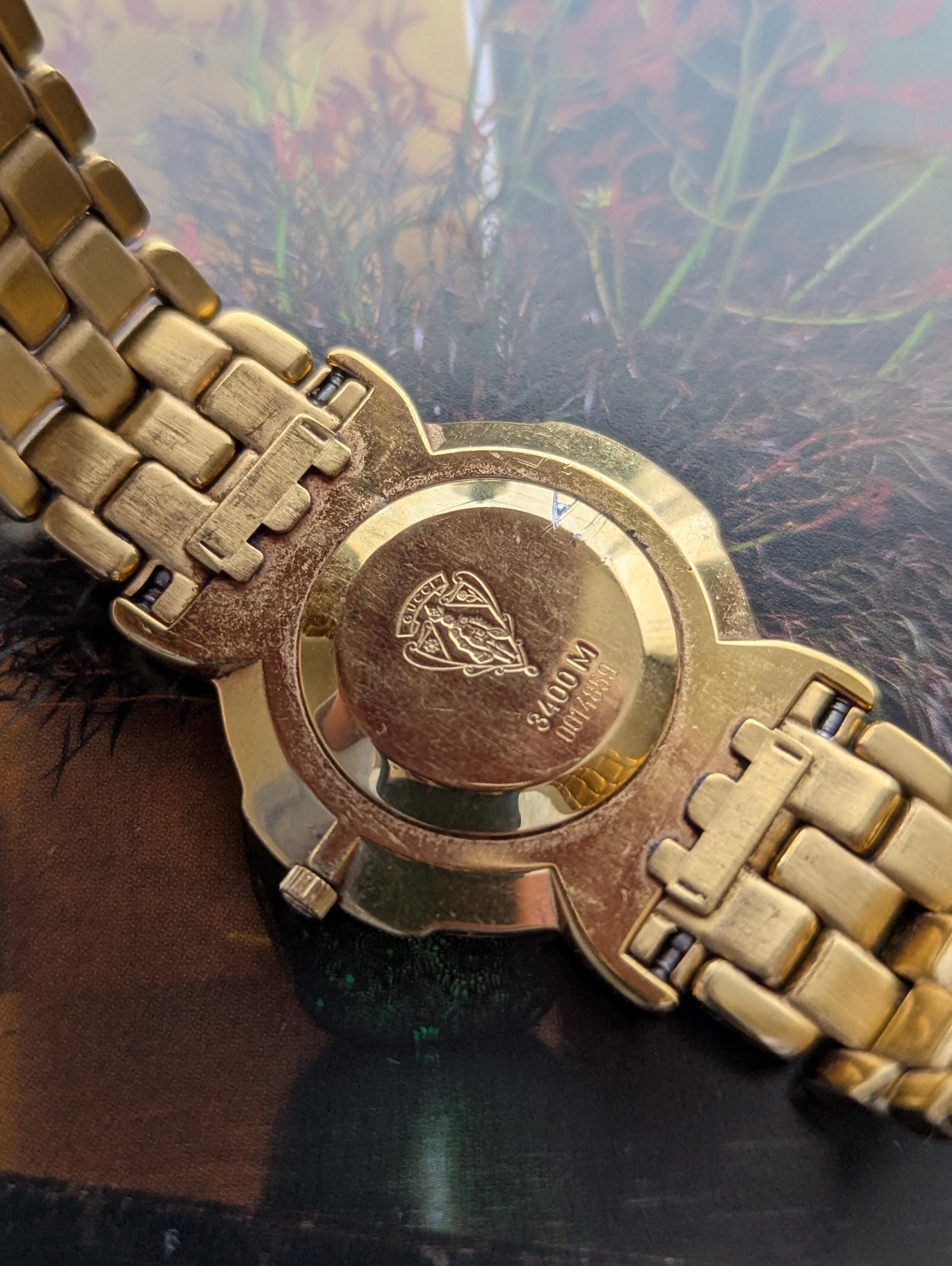 Vintage GUCCI Gold Tone Quartz Watch With Black Face
