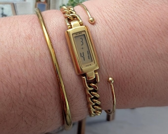 Vintage ALBA by Seiko Gold Tone Digital Quartz Watch with Cuban Link Chain Band and New Battery.  Best fits 7” wrist or smaller.