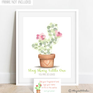 thumbprint cactus guestbook alternative shown with pink and green fingerprints added to fill in the outline of a cactus, shown in a terracotta style pot with text stay sharp little one, you are so loved below, meganhstudio