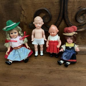 Lot of Four Small German Dolls, 1950s-1970s. West Germany & East Germany Edi, etc
