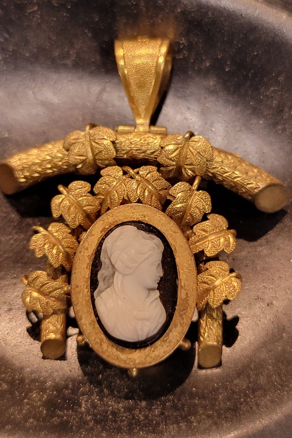Vintage gold tone cameo brooch and pendant