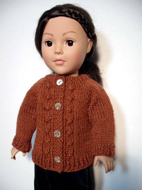 Hand-knit cable cardigan sweater for American Girl and other 18” dolls and bears.