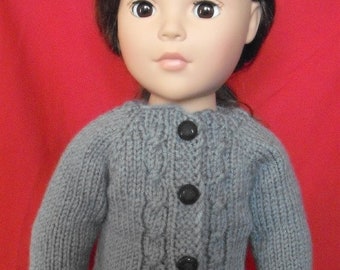 Hand-knit cable cardigan sweater for American Girl and other 18” dolls and bears.