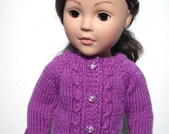Hand-knit cable cardigan sweater for American Girl and other 18” dolls.