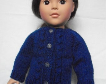 Hand-knit cable cardigan sweater for American Girl and other 18” dolls and bears.