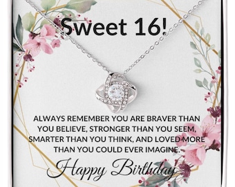 May include: A silver necklace with a crystal knot pendant comes in a white gift box with a floral design and the text "Sweet 16!" and "Happy Birthday". The box also includes the message "Always remember you are braver than you believe, stronger than you seem, smarter than you think, and loved more than you could ever imagine."