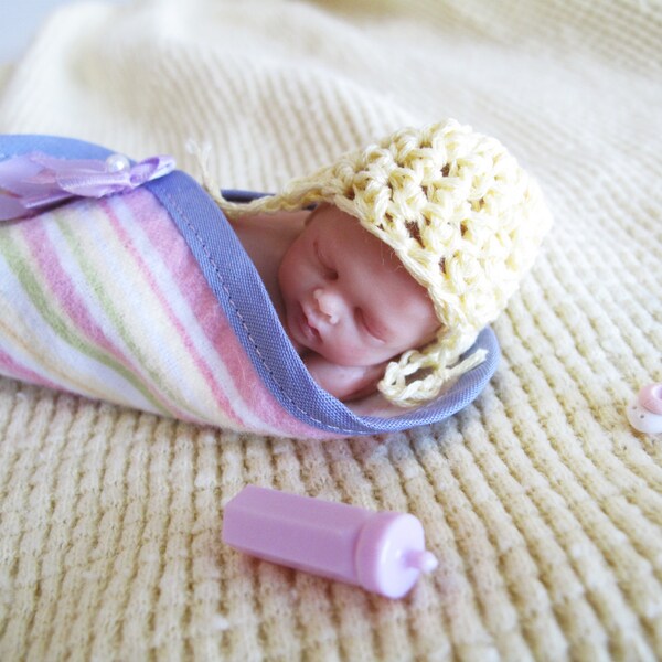 Miniature OOAK polymer clay baby with striped purple wrap and crochet hat, cake topper or keepsake baby gift