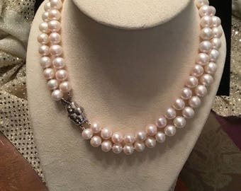 Glorious Cultured Pearls. Freshwater and near flawless. Lovely white. 16" Style 11mm