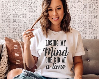 Losing my mind one kid at a time tee