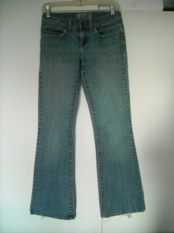 embroidered distressed jeans