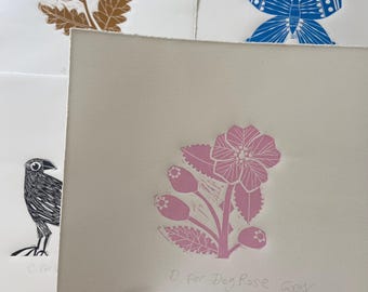 D for Dog Rose, handmade linocut artwork.