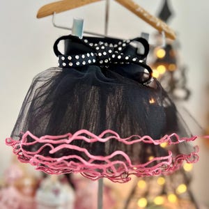 Small Dog Black Tutu Skirt with Crystal Bow and Pink Rolled Hem.
