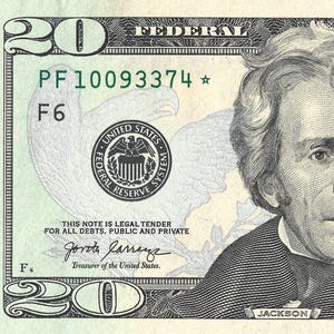 May include: A twenty-dollar bill featuring a portrait of Andrew Jackson. The bill is primarily green and black, with the text "The United States of America" and "Twenty Dollars" prominently displayed. The serial number is PF10093374.