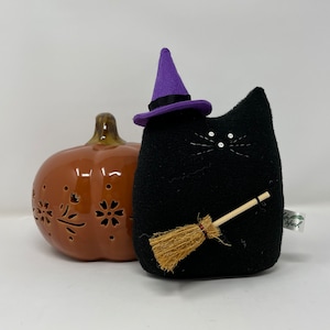 Gato brujo de peluche