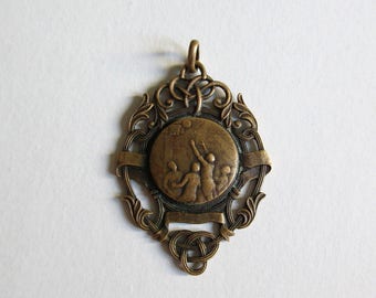 antique brass basketball medallion, pendant