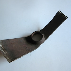 vintage or antique hand hammered iron adze