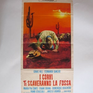 May include: A vintage movie poster for the film "I Corvi Ti Scaveranno La Fossa" (The Crows Will Dig Your Grave) featuring a man kneeling in the desert with a sunset in the background. The poster is in Italian and features the names of the actors and director.