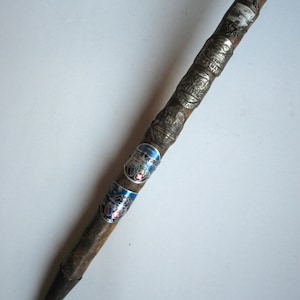 antique walking stick with 17 badges