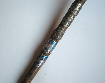 antique walking stick with 17 badges