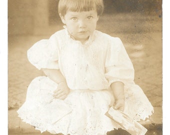 Boy Holding a Photo Photo Postcard, c. 1910