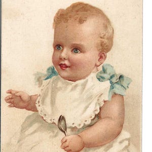 Carte postale Un bébé à la cuillère, v. 1910