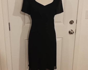 Svart damklänning i polyester/acetatfodrad, halvtransparent, blushe-modell från Spiegel, storlek 12/kort vintageklänning för speciella tillfällen, storlek 12