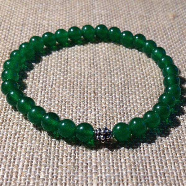 6mm Green Jade stretch bracelet with sterling silver granulated Bali bead