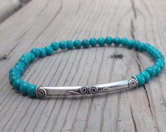 4mm turquoise Magnesite stretch bracelet with 35mm Sterling Silver Bali tube bead