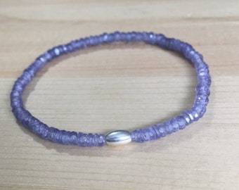 4mm faceted Tanzanite Rondell stretch bracelet with a Sterling Silver bead