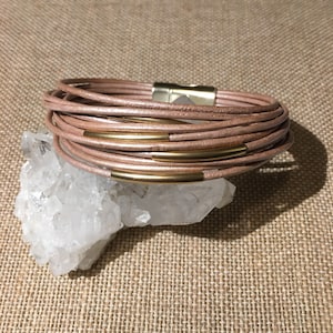 Multi-strand metallic Pink leather bracelet with gold filled tube beads and gold tone magnetic clasp