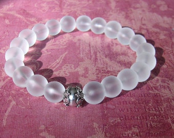 10mm Matte Clear Quartz stretch bracelet with a Sterling Silver Bali Bead