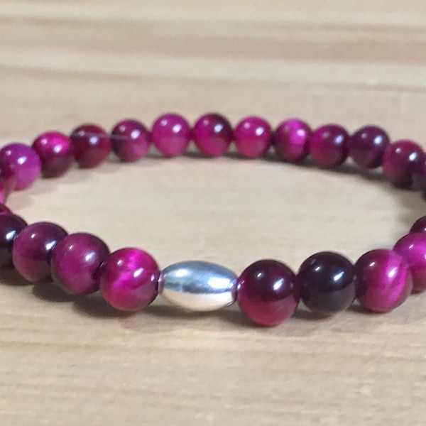 Bracelet extensible oeil de tigre magenta 6 mm