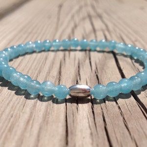 4mm Blue Sponge Quartz stretch bracelet with a sterling silver tube bead